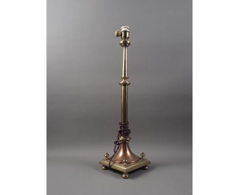 A brass and copper lamp base, 22" high, and an oil lamp with milk glass shade 