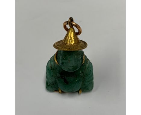 A 14ct jade buddha charm