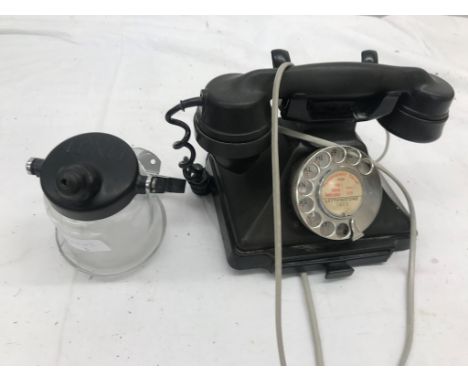 A vintage glass and bakelite hand sanitiser by Lorco; together with a vintage telephone