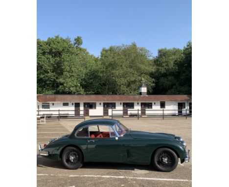 A Jaguar XK150 Coupe first registered 20th November 1959: Registration 568 XUU, green paintwork , left hand drive, with logbo