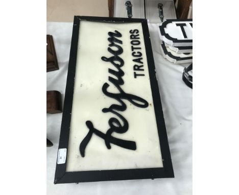 A vintage 'Ferguson Tractors' sign (illuminated)