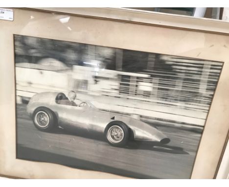 A rare vintage photograph showing Tony Vanvervell at the 1956 Goodwood Festival trying out a new Vanhall. Large format black 