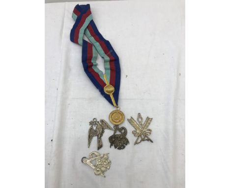 A London Lodge silver medallion on sash; together with Masonic devices