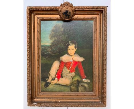A gilt frame with armorial design containing an oleograph depicting a young boy in a landscape, sight 45 x 33 cm