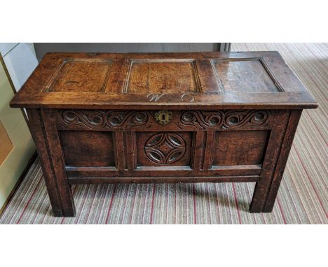 17TH CENTURY OAK COFFER, jointed construction, original carved frieze and central panel, initialled 'W O', original escutcheo