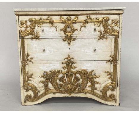 FLORENTINE COMMODE, 18th century and later with three carved giltwood panelled drawers, 52cm x 99cm x 90cm H. 