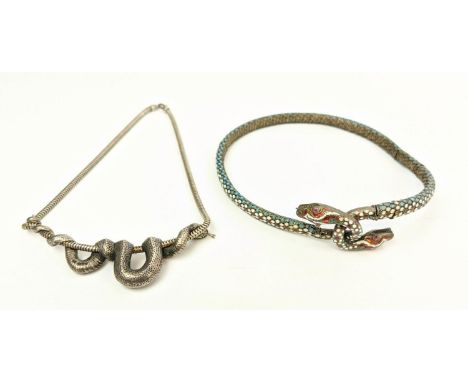 A STERLING SILVER AND ENAMEL CHOKER SNAKE NECKLACE, with garnet eyes, plus a silver serpent, snake necklace by Lexi Dick, Lon