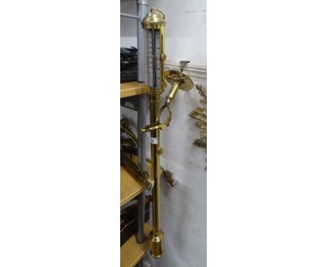 A brass ships barometer complete with gimball.