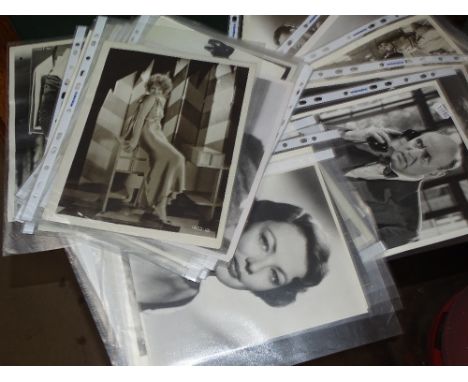 Photographs of various film stars including Alistair Simm, Bette Davis, Claira Bow, etc.