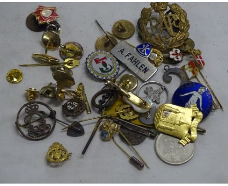 Assorted enamel and other badges.