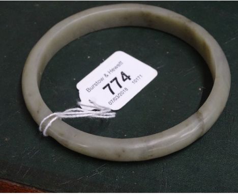 A large jade bangle.