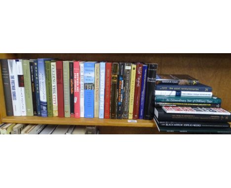 A shelf of various books.