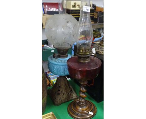 Barleytwist oak based oil lamp with cranberry font and another oil lamp.