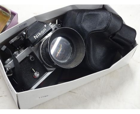 A Nikon camera and a Fujica camera.