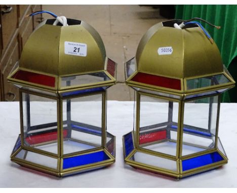 Pair of modern hexagonal ceiling light fittings.