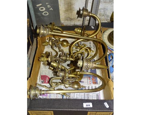 A 5-branch brass wall light fitting and various other wall lights.