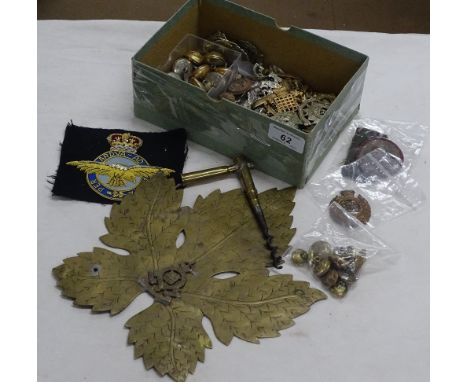 Brass Royal Canadian Ordnance Corps. plaque, regimental buttons and badges.