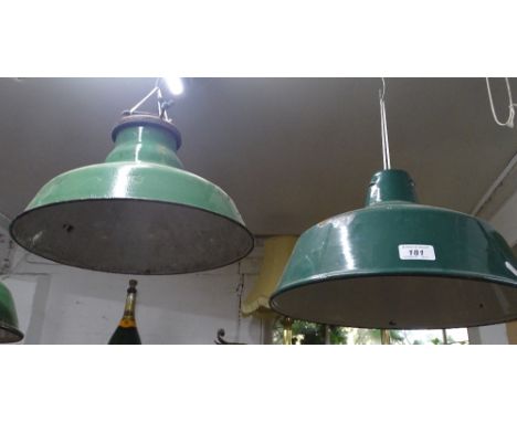 2 Similar green and white enamel industrial ceiling light shades.