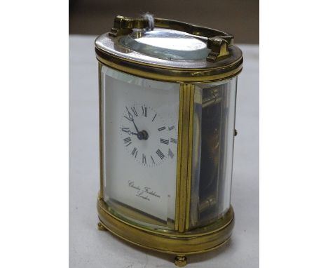 A small brass carriage clock, Charles Frodsham, London.