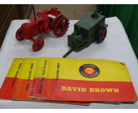Carved and painted wood tractor and trailer and 5 Shell tractor lubrication books.