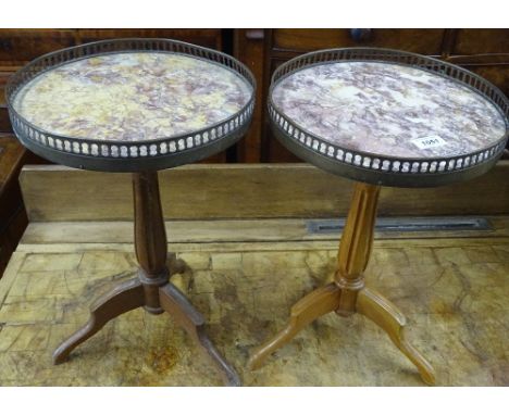 Pair of continental walnut and circular marble top occasional tables, with pierced brass galleries on tripod legs, height 1'6