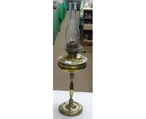 An Edwardian brass oil lamp.