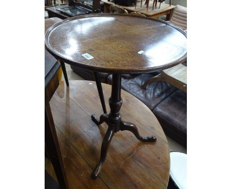 A Georgian oak tilt top tripod table, with dish top, width 1'10", height 2'3".