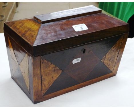 A sarcophagus tea caddy with parquetry work decoration and sectioned interior.