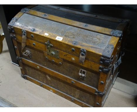 A 19th century oak and steel bound domed top travelling trunk with fitted inner tray, length 2'3", height 1'9".