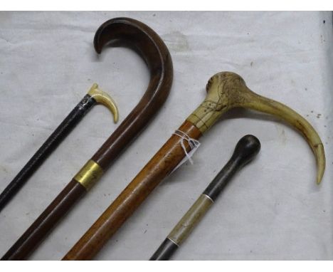 Early 19th century Georgian walking stick with engraved antler handle "Be Ye Also Ready," lady's riding crop, a baton and a w