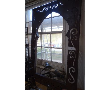 A metal Moorish design panel with shaped and pierced decoration, width 3'3", height 4'11".