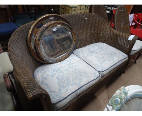 A gold Lloyd Loom bow arm 2-seater settee and a pair of matching chairs