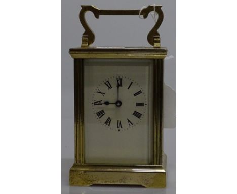 A brass-cased carriage clock GWO
