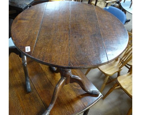 A George III oak tilt-top tripod table