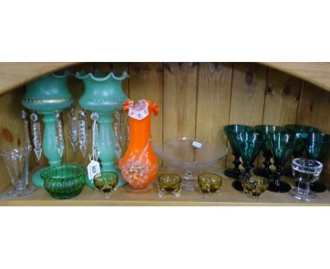 A shelf with table lustres, Bristol Green glasses etc