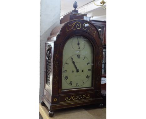 An early 19th century mahogany and brass inlaid dome top mantel clock, painted dial signed Gray of London and 8-day striking 