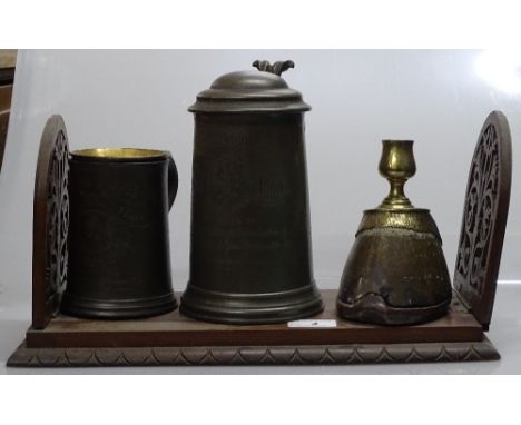 A Victorian brass-mounted horse hoof candlestick, a Victorian carved walnut extending book rack, enamelled brass vase and 2 V