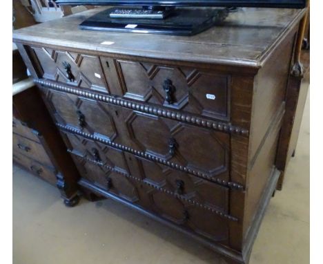 A Jacobean oak 2-section chest, with 4 long moulded front drawers on bracket feet, W 98cm