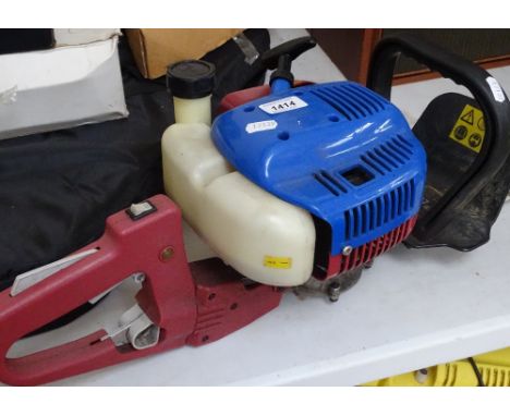 A Sovereign petrol chainsaw 