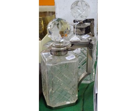 A WMF cut-glass and plated lockable decanter, and another (2)