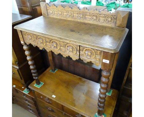 A carved oak side table single drawer on bobbin turned legs, W 90cm