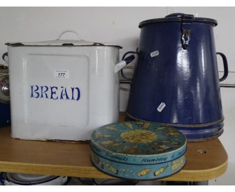 An enamelled bread bin, an enamel canister and biscuit tin (3)