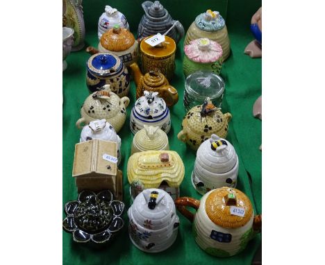 A collection of Vintage pottery and glass honeypots
