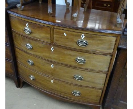 A 19th century mahogany bow front chest, with satinwood cross-banded top, on bracket feet, W 106cm