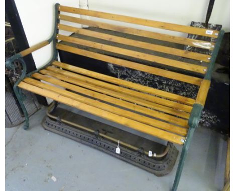 A slatted and cast-iron garden bench, W 130cm