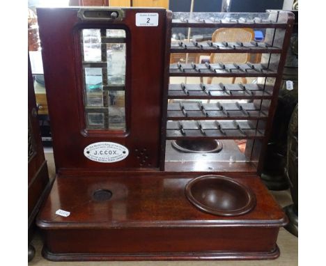 A 19th century mahogany double-sided pub till by JC Cox, with original enamel plaques, brass mounts and drawer under, height 