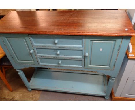 A painted and polished cabinet, with fitted drawers and cupboards and shelf below, W 130cm