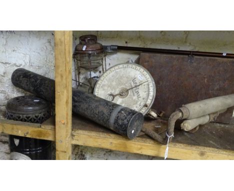 A tilley lamp, a Vintage gas stove, hay cutters, scales etc