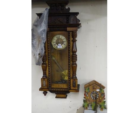A Victorian rosewood cased 2-train regulator wall clock, and a modern cuckoo clock