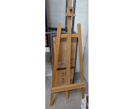 A pine adjustable artist's easel
